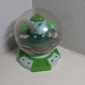 Nintendo Green and Gray Bulbasaur Figure in Dome